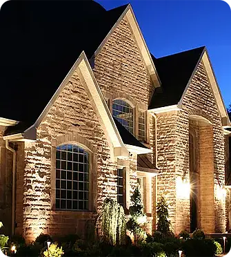 ScapeWorx delivers again with an elegant brick home with architectural landscape lighting in Thornbury