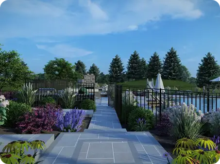 Landscaped path leading to a pool area, featuring colorful flowers and elegant stone pavers.