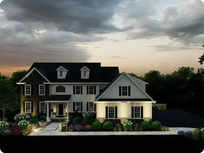 ScapeWorx landscape renovation with fresh plantings and lighting around the front of a home