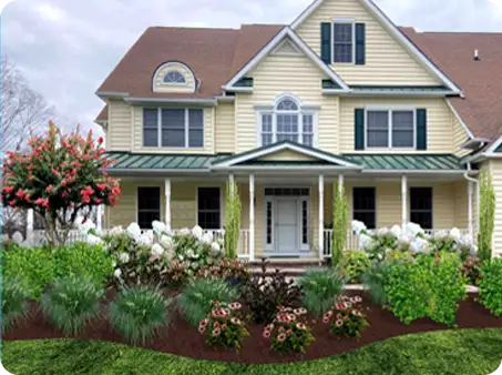 Front yard renovation with vibrant shrubs and flowers by ScapeWorx.