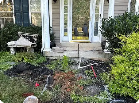 Front porch landscape renovation in progress by ScapeWorx.
