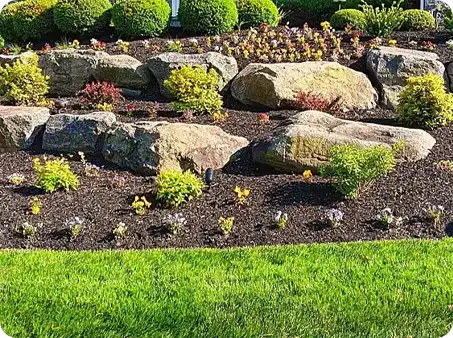 Spring clean up with fresh mulch and colorful plant beds