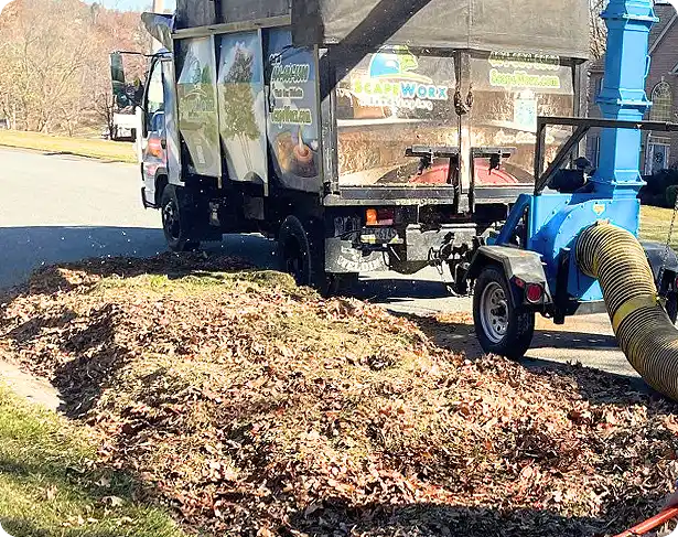 ScapeWorx truck with vacuum equipment during fall clean up Wallingford