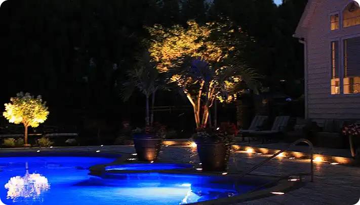 Poolside landscape lighting by ScapeWorx in Aston, PA